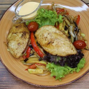 Стейк из куриного филе с овощным соте